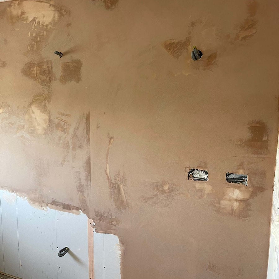 Wall opened up ready for insulation and repair