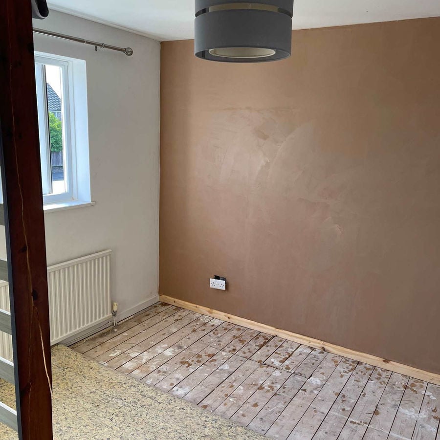 Room replastered and finished after damp treatment